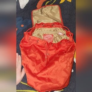 Orange coach backpack